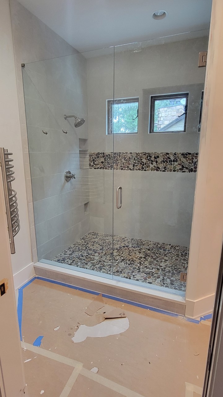 Glass Shower Area With Tile Accent