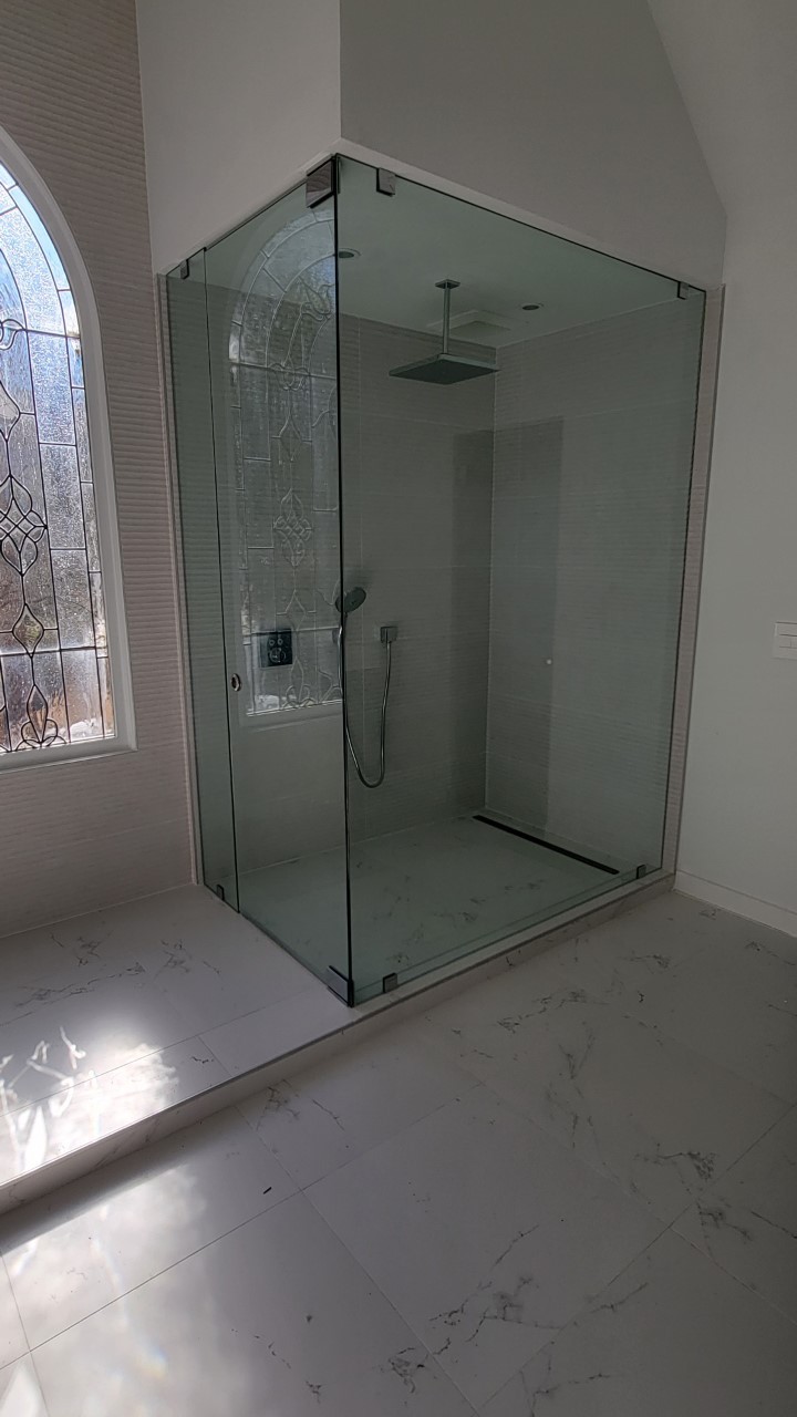Bathroom With Glass Shower Room In The Corner