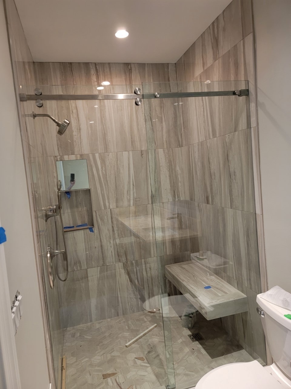 Glass Shower Door With Stainless Frame On The Top